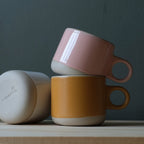 dipped stoneware mug on a kitchen counter