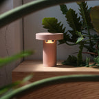 Slot Table Lamp in Red showing three slot openings