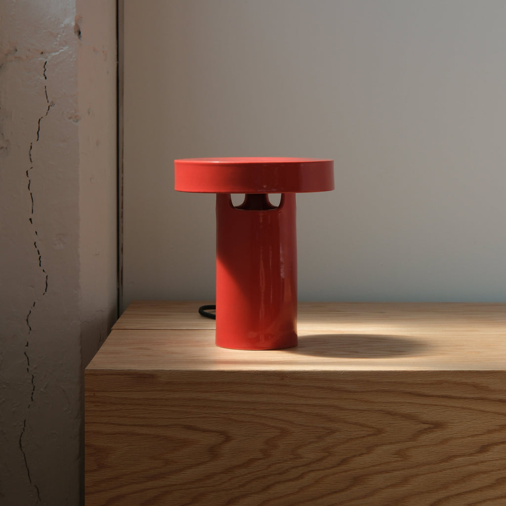 Slot Table Lamp scale against a wall