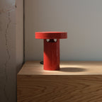 Slot Table Lamp scale against a wall