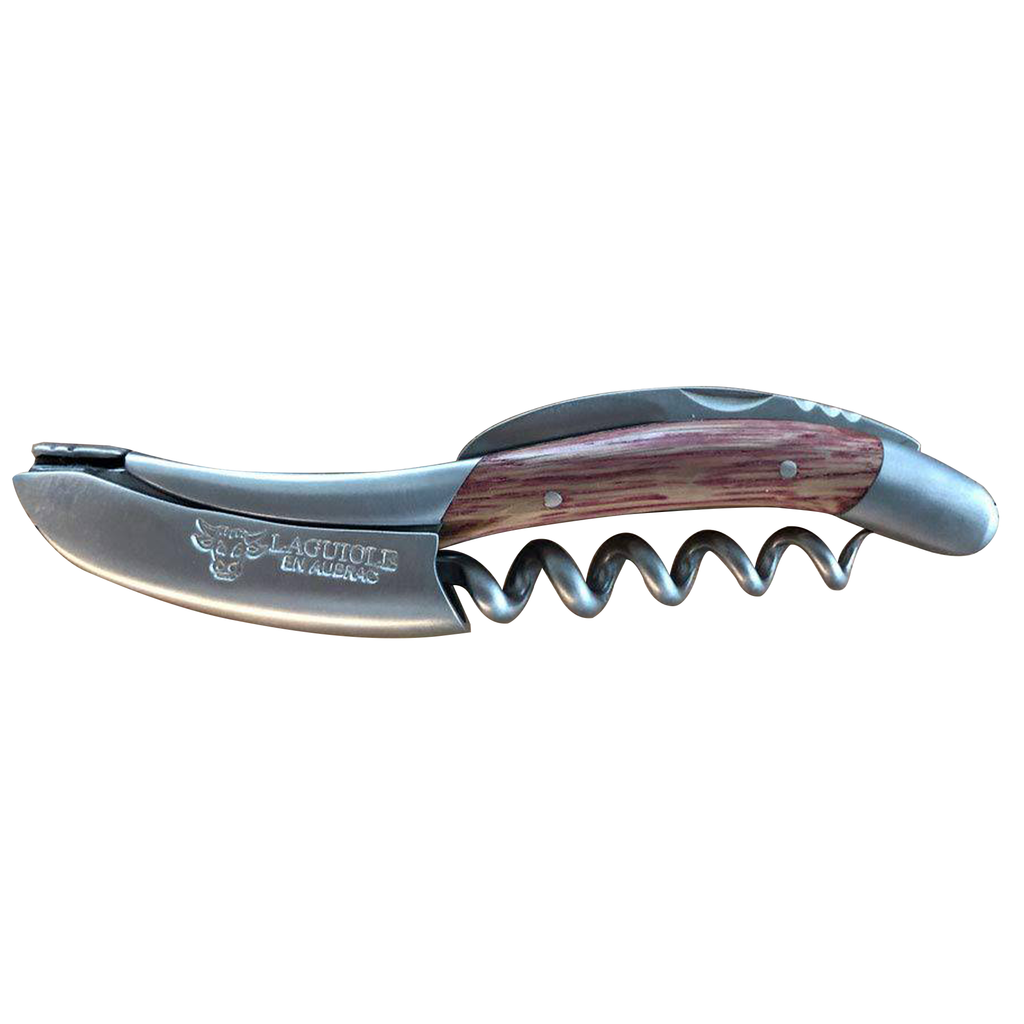 Laguiole barrel wood corkscrew with red tinted handle on a white background
