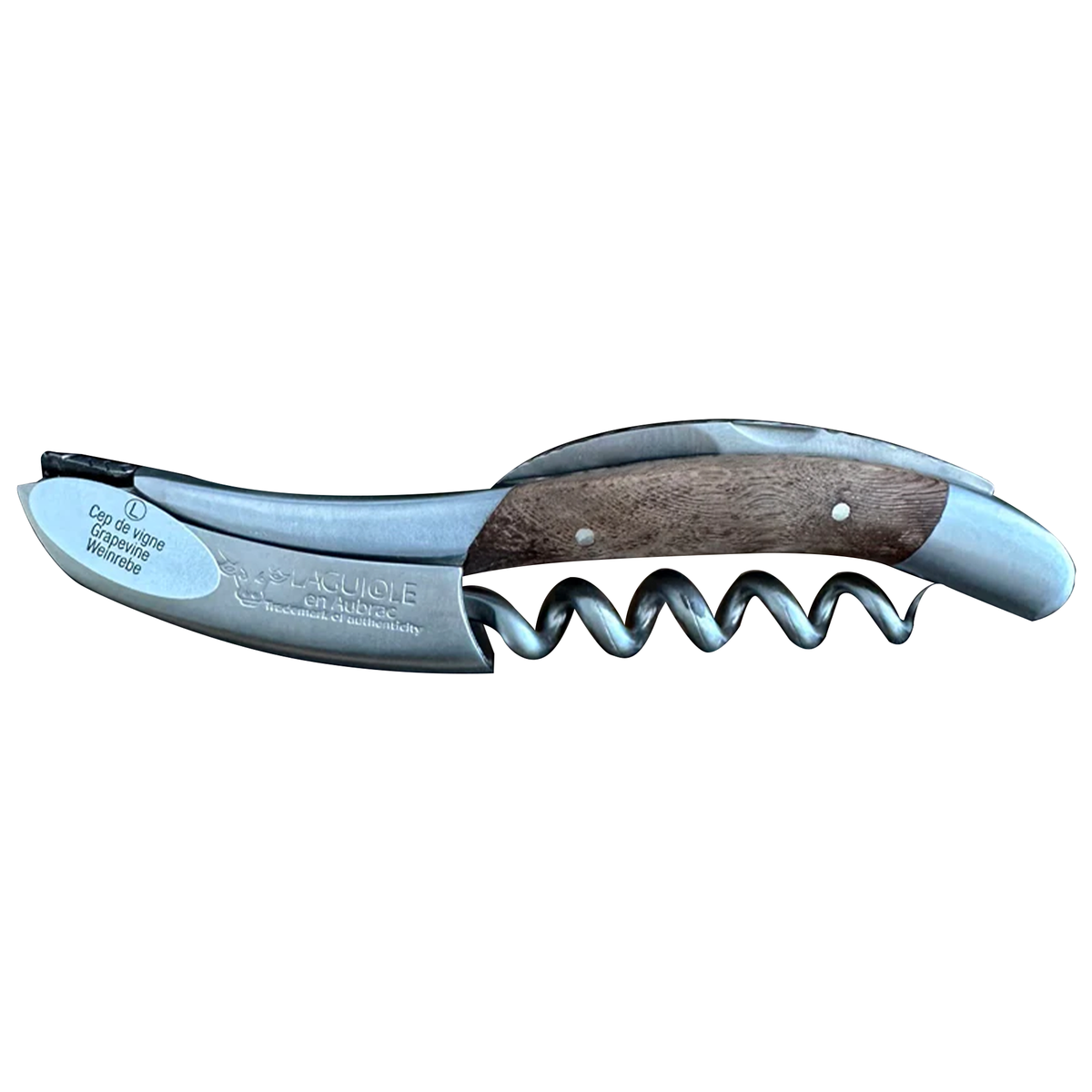 Laguiole DeLuxe No. 6 grapevine corkscrew with carved spine on a white background
