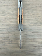 Corkscrew held upright with the spiral pointing down