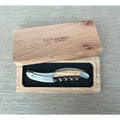 Laguiole numbered olive wood corkscrew with black inlay in its open oak box