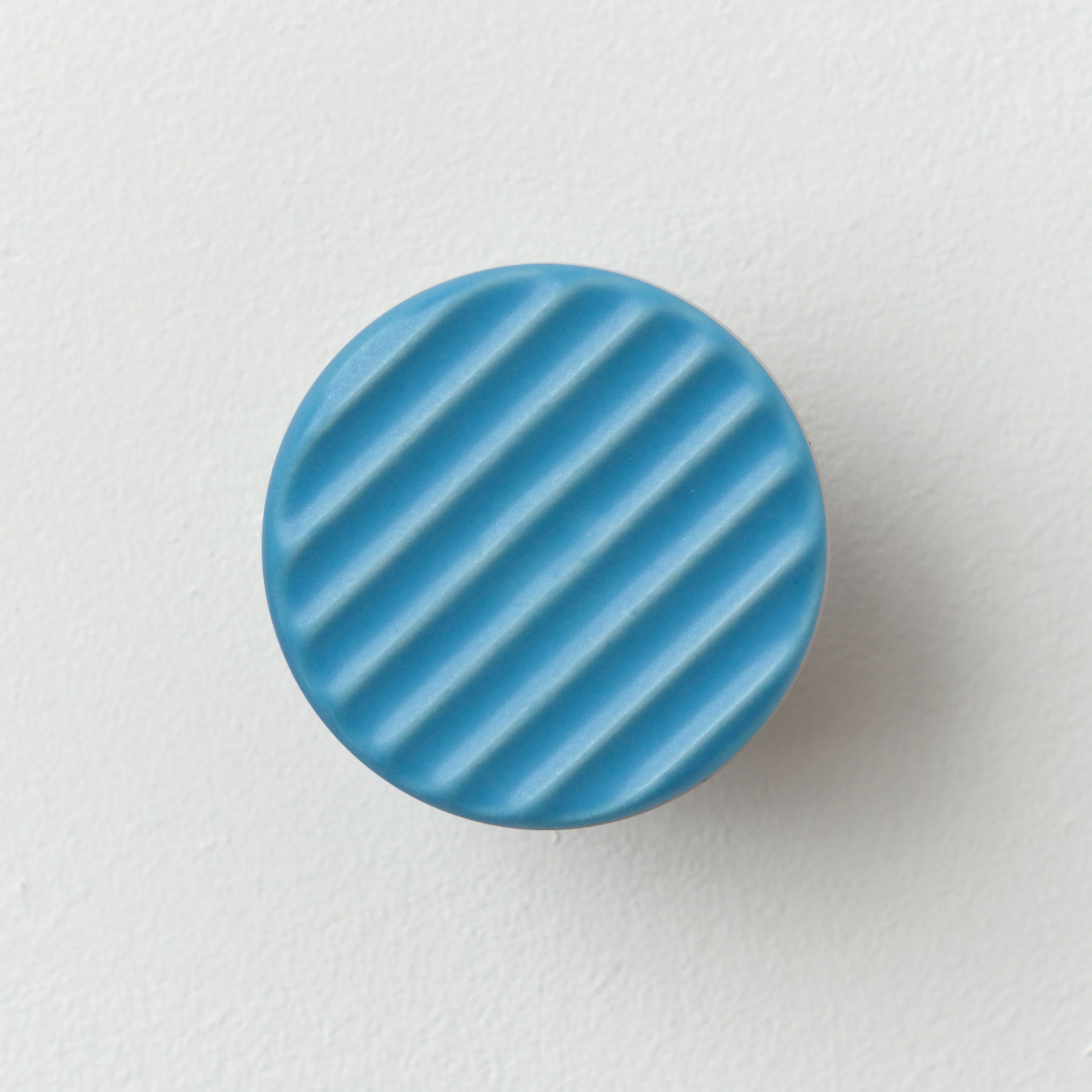 handmade ceramic coat hook with fluted ridges