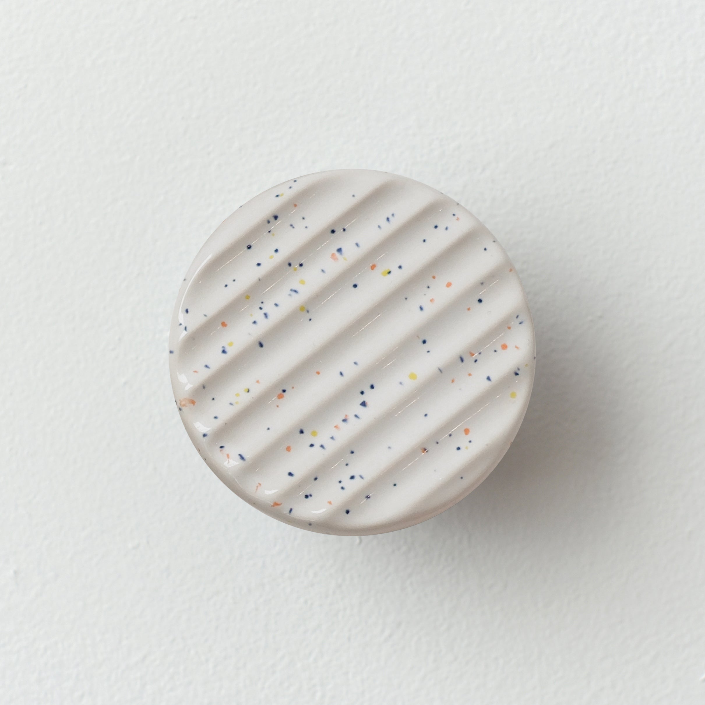 handmade ceramic coat hook with fluted ridges
