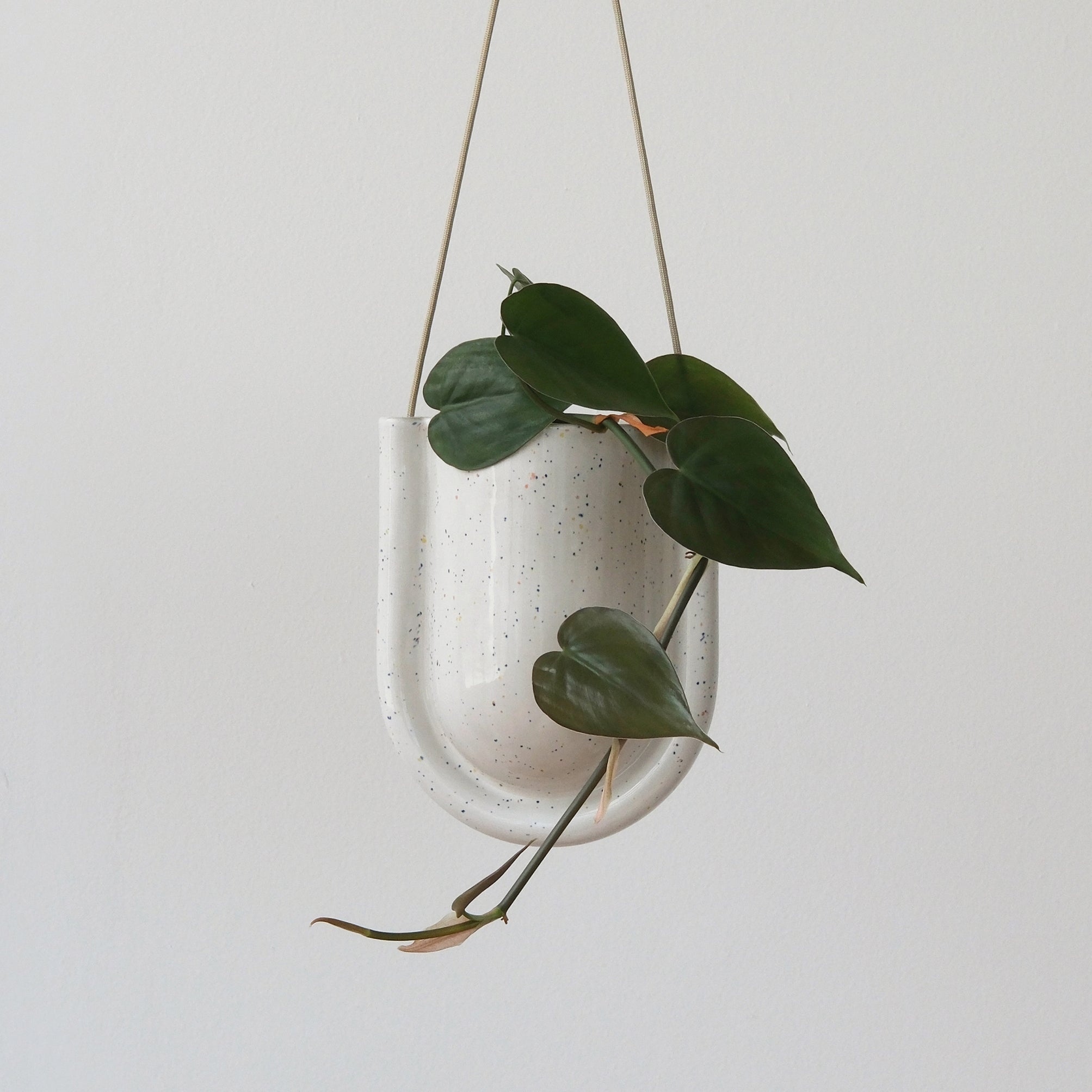 Portico hanging planter integrated drainage detail