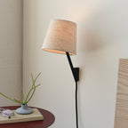 Tokyo Sconce in brass finish wall-mounted