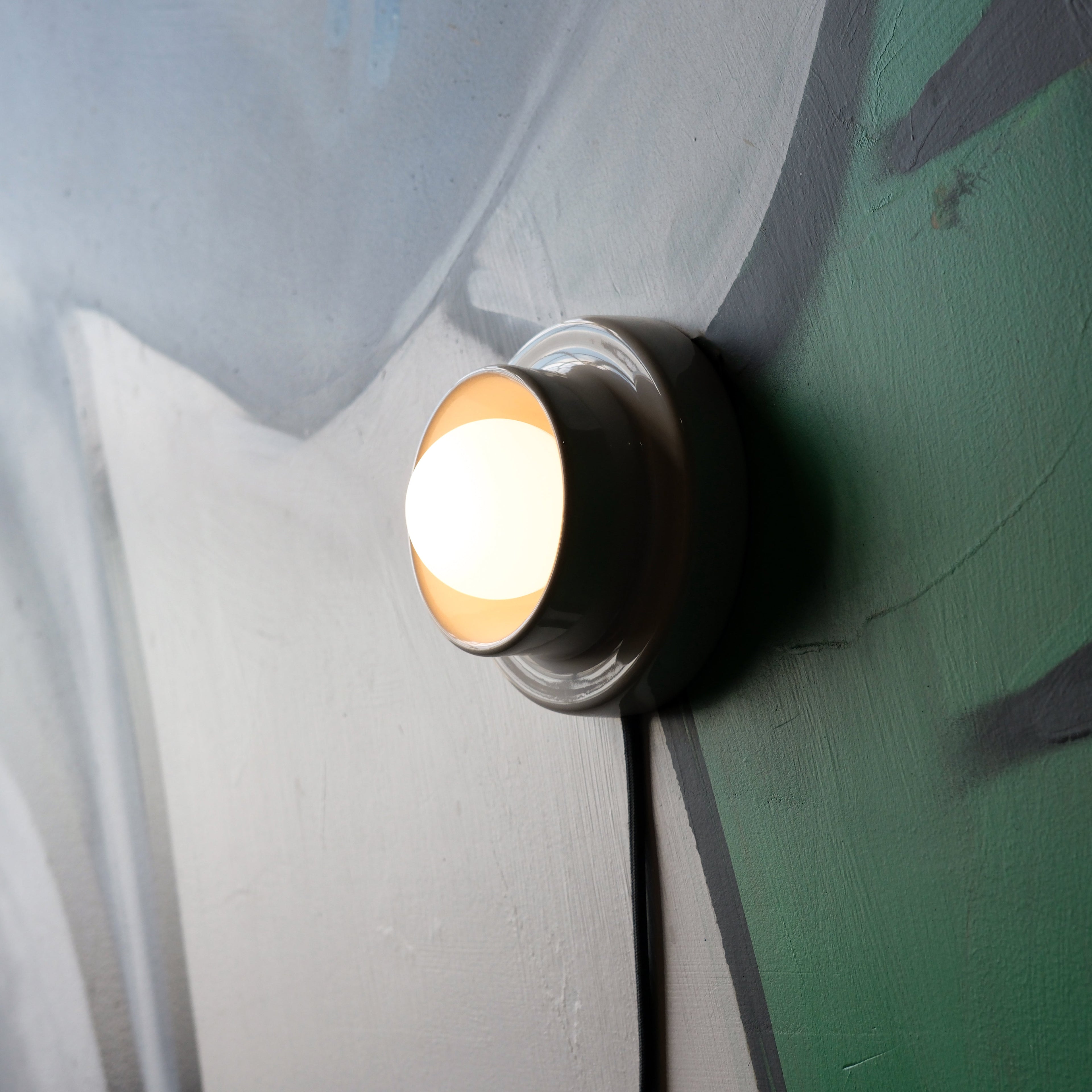 Q Sconce shallow profile against wall
