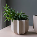 Wrap planter drainage plate detail