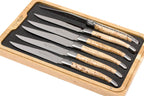 Six birch handled knives in the foam tray at an angle