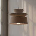 cotton pendant lamp hanging over a dining table