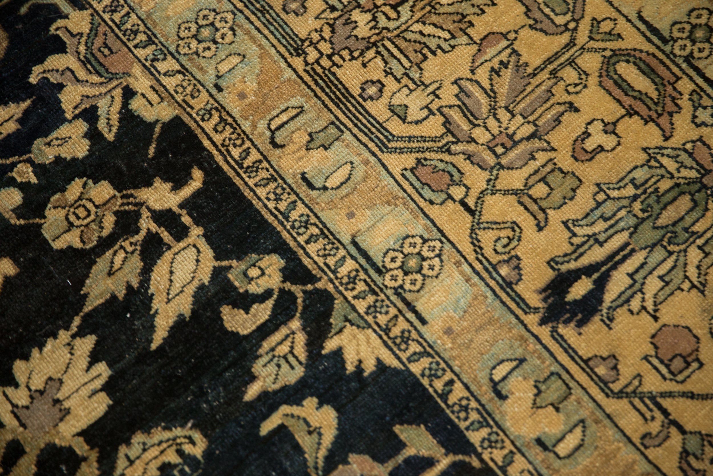 Back of the hand-knotted rug showing construction
