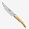 Laguiole 6 inch chef knife with olive wood handle on a white background