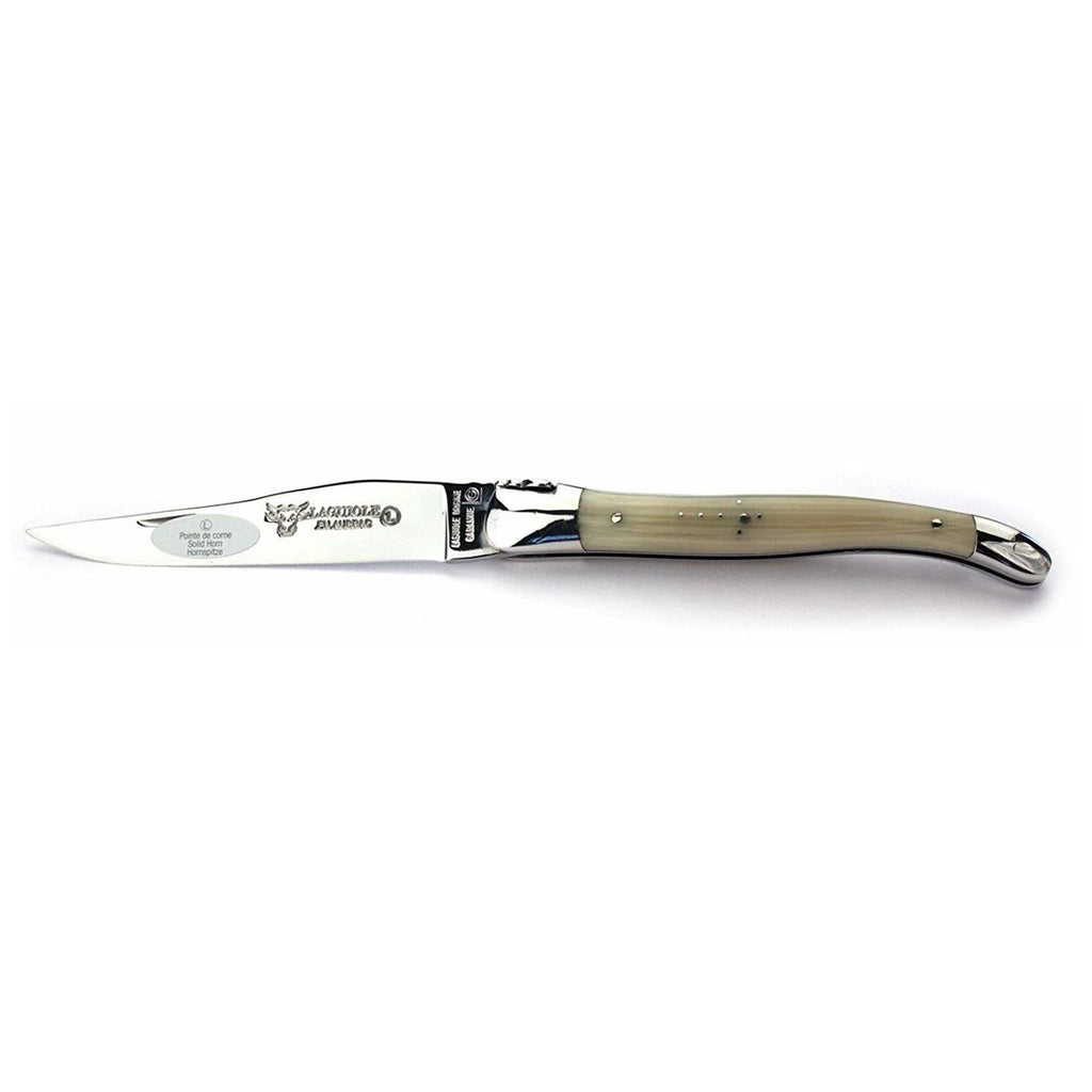 Laguiole horn folding knife with pale solid horn handle, open on a white background