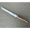 Laguiole serrated bread knife with teak handle on a grey wood surface