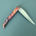 Knife half open with the blade pointing right