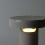 Slot Table Lamp lit, horizontal bands of light